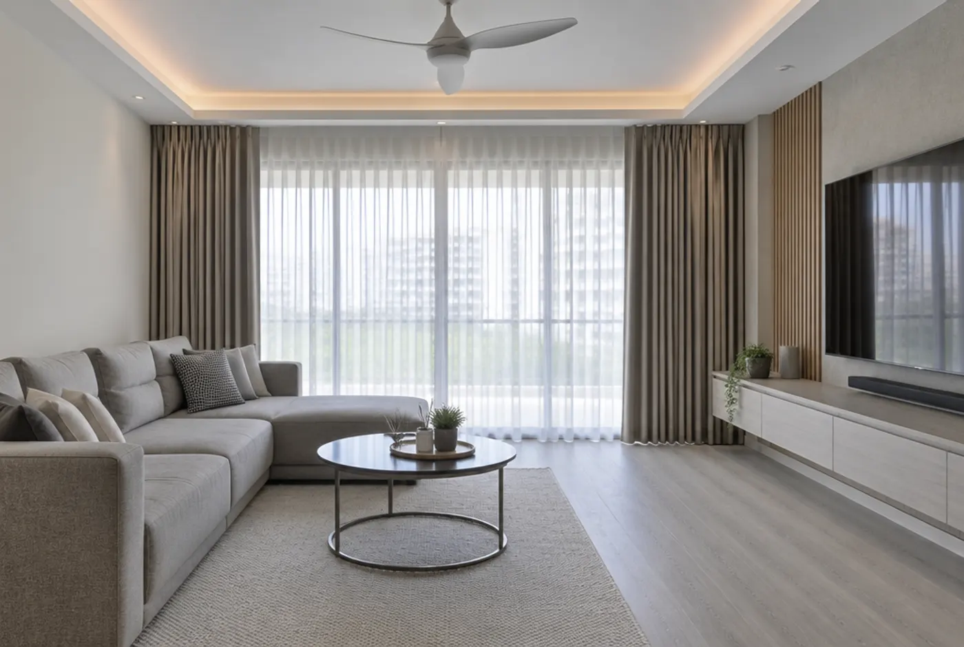 BTO living room with sheer day curtains and night curtains on a double track